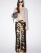 Коричневі брюки Acne Studios з принтом: фото 1 - Invogue