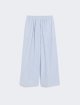 Голубые штаны WEEKEND MAX MARA из хлопкового сатина: фото - Invogue