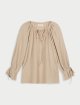 Темно-бежевая блуза By Malene Birger свободного кроя: фото - Invogue