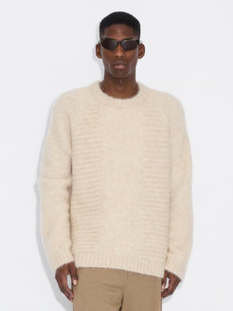 Кремовий светр Holzweiler з альпаки: фото - Invogue