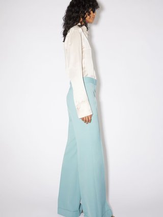 Голубые брюки клеш Acne Studios: фото 3 - Invogue