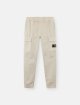 Сірі штани Stone Island з бавовни з додаванням еластану: фото - Invogue