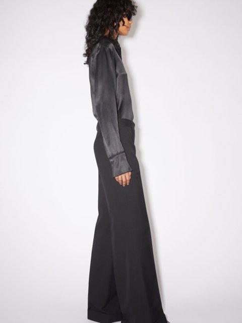 Черные брюки клеш Acne Studios: фото 3 - Invogue