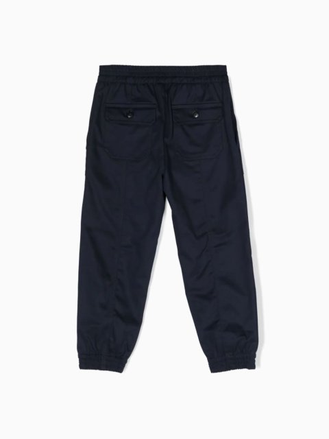 Синие брюки EMPORIO ARMANI с металлической эмблемой: фото 1 - Invogue