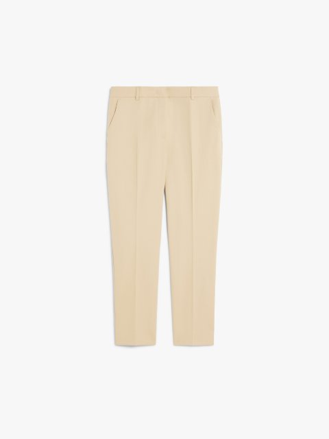 Бежеві брюки  Weekend Max Mara з еластичної бавовни: фото - Invogue