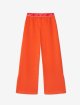Оранжевые брюки OFF WHITE с логотипом: фото 1 - Invogue