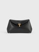 Чёрный клатч Toteme из кожи: фото - Invogue