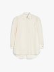 Молочна блуза Max Mara з пишними плечима: фото - Invogue