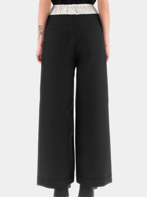 Черные брюки Acne Studios свободного кроя: фото 2 - Invogue