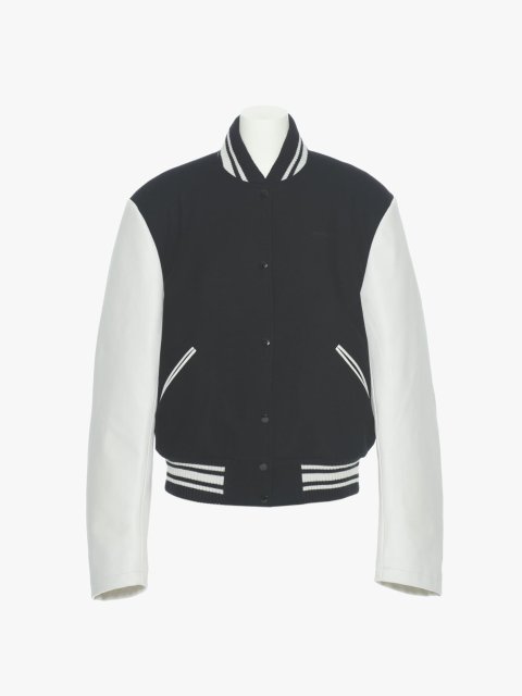 Черная куртка PUSHBUTTON с контрастными рукавами: фото - Invogue