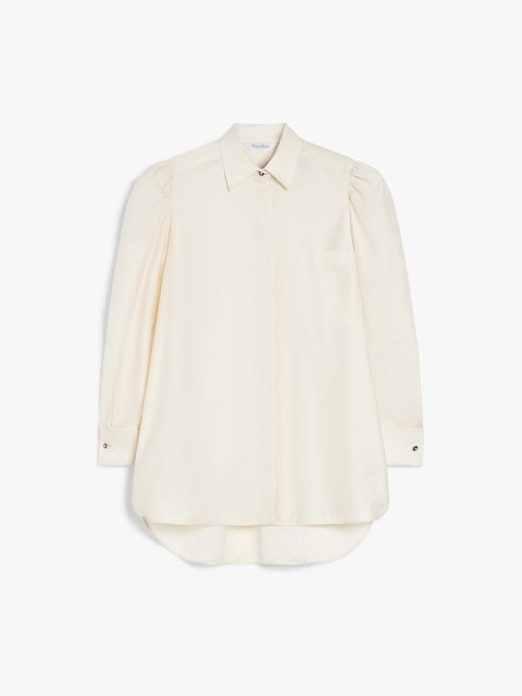 Молочна блуза Max Mara з пишними плечима: фото - Invogue