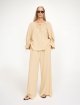Темно-бежевая блуза By Malene Birger свободного кроя: фото 1 - Invogue