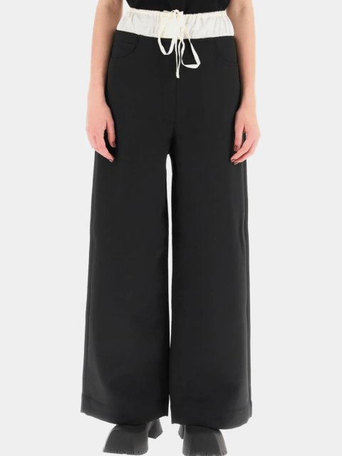 Черные брюки Acne Studios свободного кроя: фото 1 - Invogue