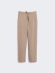 Кремовые брюки MAX MARA из эластичной шерсти: фото - Invogue