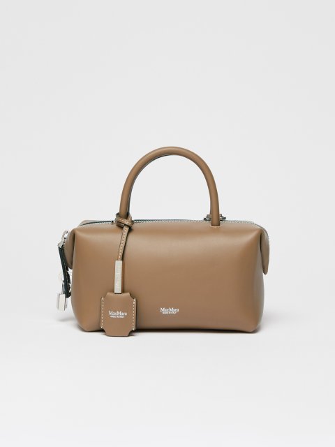 Темно-бежева сумка-саквояж Max Mara шкіряна: фото - Invogue