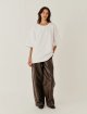 Коричневые брюки The Garment из кожи: фото 1 - Invogue