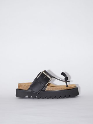 Черные шлепанцы Acne Studios из кожи: фото - Invogue
