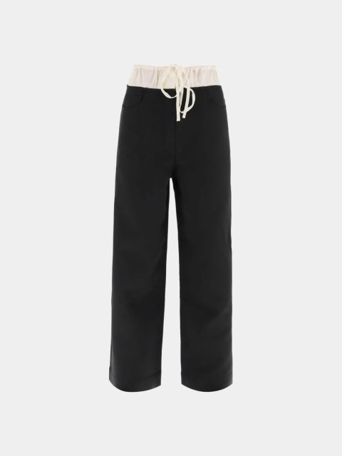 Черные брюки Acne Studios свободного кроя: фото - Invogue