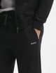 Черные брюки BOSS из хлопка и эластана: фото 4 - Invogue