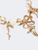 Золотисте кольє Weekend Accessories з металу та рафії: фото 2 - Invogue