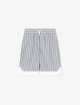 Бермуди з бавовняного джерсі в смужку Emporio Armani Kids: фото - Invogue