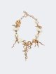 Золотисте кольє Weekend Accessories з металу та рафії: фото - Invogue
