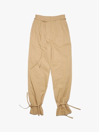 Бежевые брюки ACNE STUDIOS: фото - Invogue