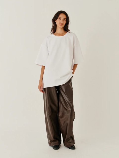 Коричневые брюки The Garment из кожи: фото 1 - Invogue