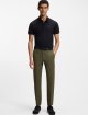 Зауженные брюки slim fit из водоотталкивающей эластичной ткани BOSS: фото 1 - Invogue