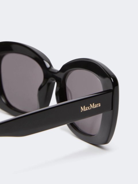 Чорні сонцезахисні окуляри MAX MARA овальної форми: фото 2 - Invogue