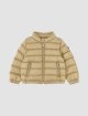 Бежева куртка Moncler стьобана: фото - Invogue