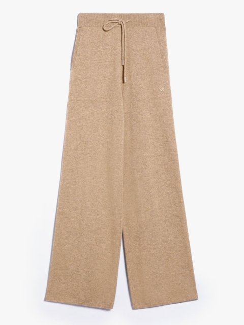 Бежевые брюки MAX MARA: фото - Invogue