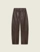 Коричневі брюки ARMA зі шкіри: фото - Invogue