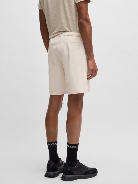 Бежевые шорты Boss с логотипом: фото 3 - Invogue