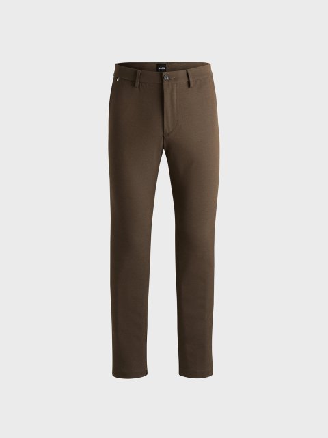 Зеленые брюки BOSS кроя slim: фото - Invogue