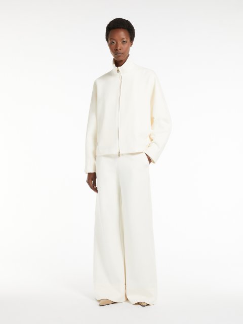 Белые брюки Max Mara расклешенные: фото 1 - Invogue