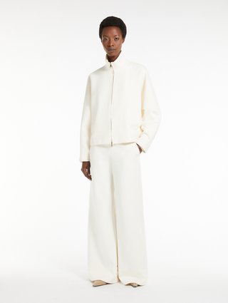 Белые брюки Max Mara расклешенные: фото 1 - Invogue