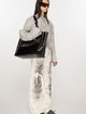 Черная сумка Acne Studios с логотипом: фото 1 - Invogue