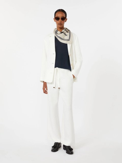 Белые брюки Max Mara из чистого льна: фото 1 - Invogue