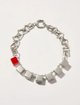 Серебристое колье Max&Co из металла и смолы: фото - Invogue