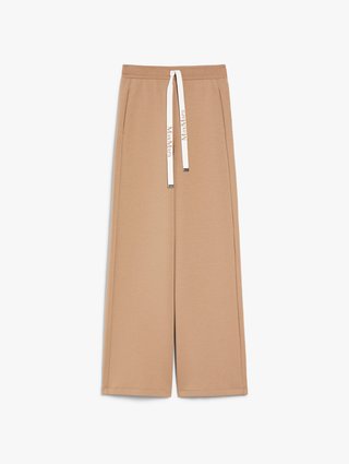 Темно-бежеві брюки Max Mara на шнурках: фото - Invogue