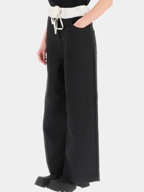 Черные брюки Acne Studios свободного кроя: фото 3 - Invogue